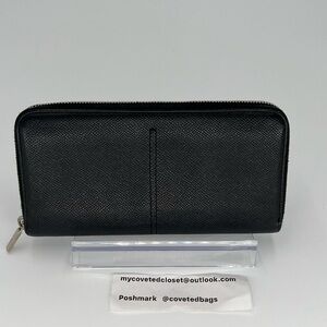 Tod's Black Leather Zippy Wallet with Silver Hardware Excellent Condition!